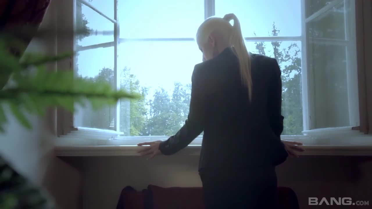 Lovely blonde model in black stockings Jessie Volt poses by the window - ePornTube