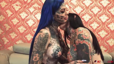 Amber Luke and Tiger Lilly enjoy passionate inked fucking